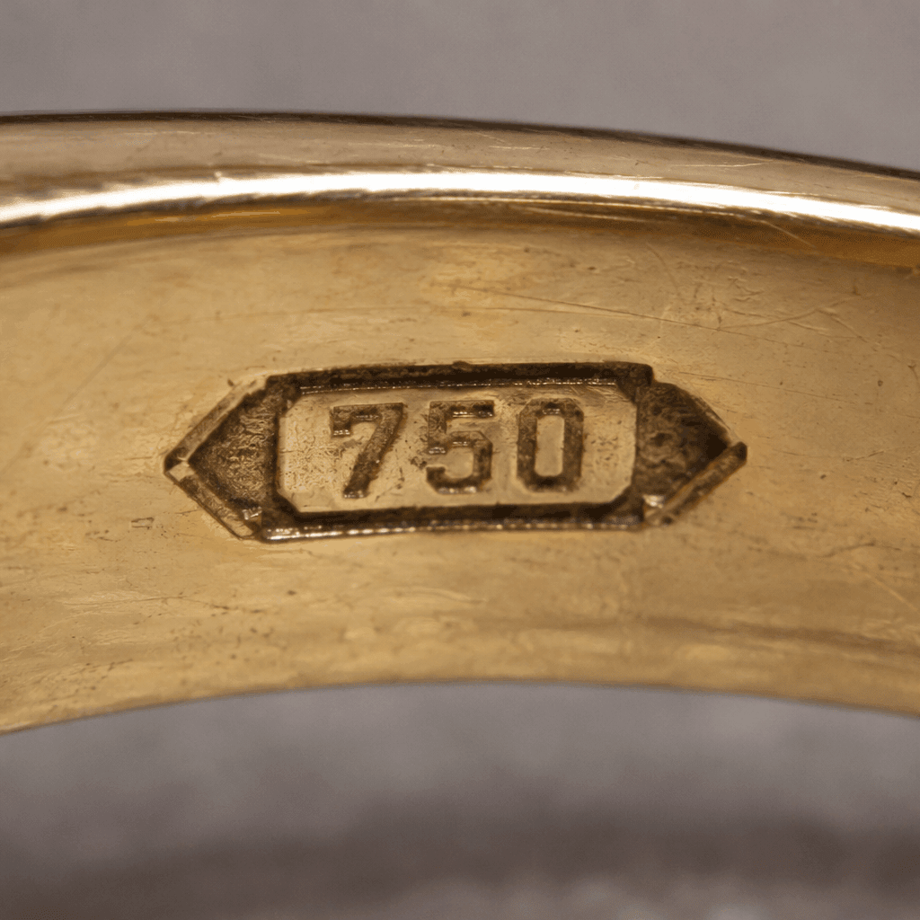 What Does 750 Mean on Jewelry? Complete Guide to 18K Gold Hallmarks - Leonids