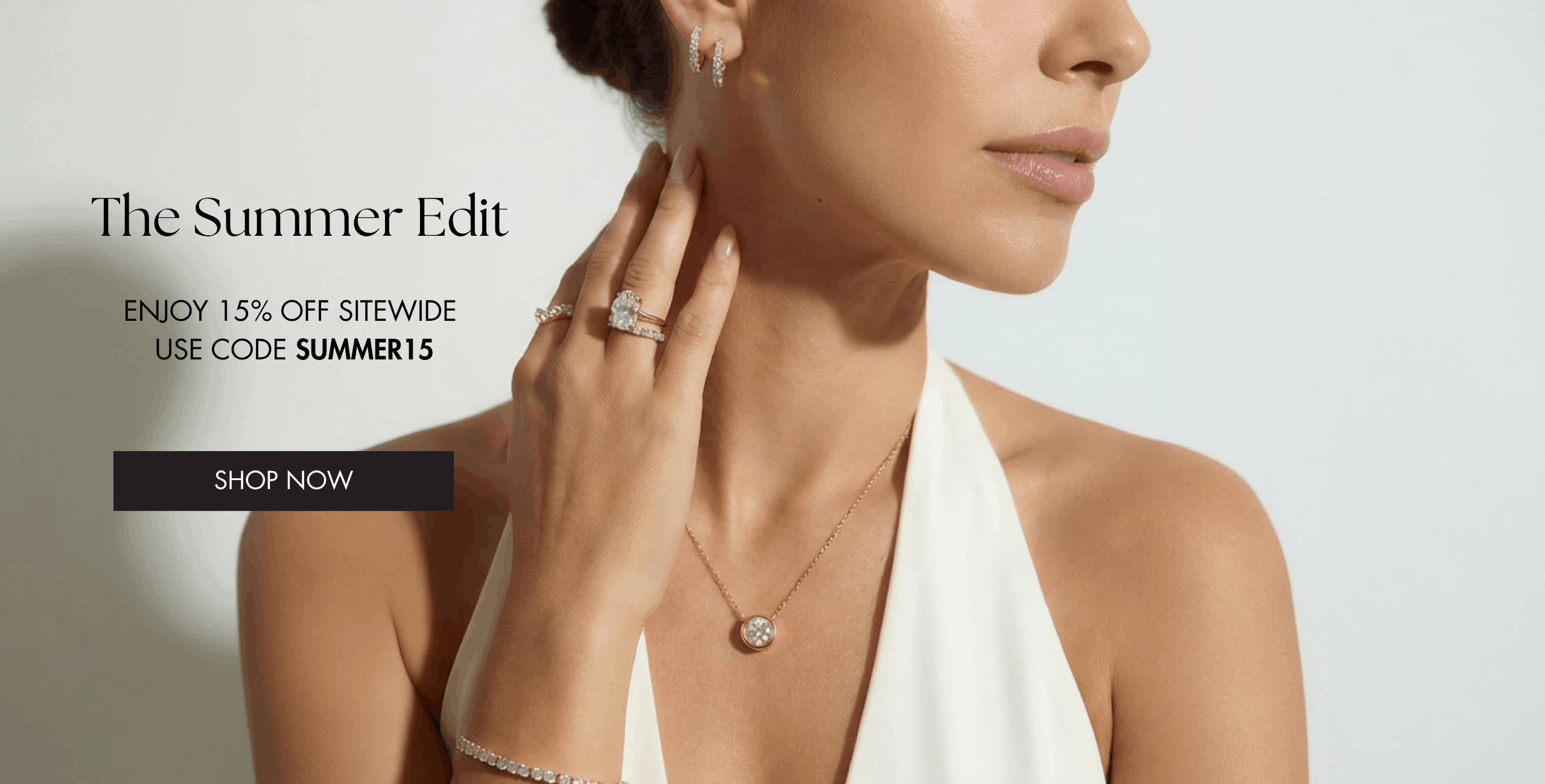 Model wearing lab grown diamond jewelry including a diamond tennis bracelet pendant necklace and engagement ring Leonids Summer Sale 15 percent off sitewide